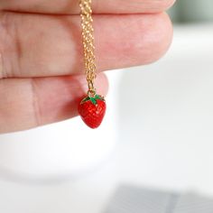 "Beautiful and cute little Strawberry charm necklace. Made of gold and enamel Strawberry with skinny gold plated skinny brass chain. Soft and warm. Great for gifts, everyday or special occasions.  Your item will ship in a gift box. Please feel free to contact me if you have any questions. ♥ Length  14\" - 20\"  ♥ Charm approx 3/8\"  ♥ Gold plated over brass / Enamel ♥ Silver color in here   www.etsy.com/listing/707121670  ♥  See more Rudiana Accessories  Rudiana.etsy.com" Cute Pendant Charm Necklace For Gift, Small Charm Necklaces For Gifts, Cute Charm Necklaces For Gifts, Cute Charm Necklaces As Gift, Cute Enamel Necklaces For Gifts, Red Enamel Charm Necklaces For Gifts, Tiny Pendant Charm Necklaces For Gift, Cute Handmade Gold Charm Necklaces, Handmade Cute Gold Charm Necklaces