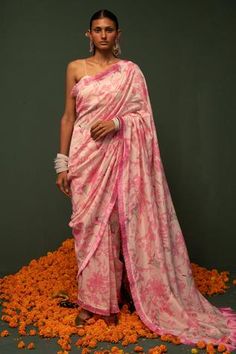 Pink chanderi silk saree with floral print and fringe lace border. Comes with unstitched blouse.
Component: 2
Pattern: Printed
Type Of Work: Floral
Fabric: Chanderi silk
Color: Pink
Other Details: 
Note: Blouse worn by the model is not for sale
Occasion: Reception - Aza Fashions Peach Lehenga, Floral Sarees, Floral Saree, Chanderi Silk Saree, Saree For Women, Printed Saree, Indian Fashion Designers, Silk Sarees Online, Pink Saree