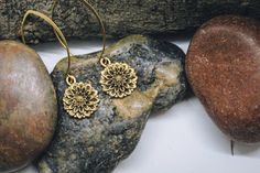 "Beautiful gold chrysanthemum dangle earrings, a simple but elegant look for any outfit! The brass ear wires measure 1 3/10\" x 9/10\", and the gold chrysanthemums measure 3/4\" x 3/5\" (Total length is approximately 2\") All items are lead and nickel free, message with any questions, thanks!" Elegant Brass Flower Earrings Nickel Free, Elegant Birth Flower Earrings For Everyday Wear, Elegant Everyday Birth Flower Earrings, Everyday Elegant Birth Flower Earrings, Gold Flower Pendant Earrings As Gift, Elegant Everyday Flower Earrings With Ear Wire, Elegant Everyday Flower Charm Earrings, Elegant Brass Flower Earrings As Gift, Gold Nickel-free Flower Earrings As Gift For Her