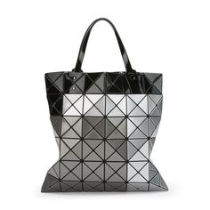 BAO BAO, the main accessories line by Japanese designer Issey Miyake, is known for signature styles made up of flexible geometric tiles. Add a graphic finishing touch to your everyday look with the Tres Tote Bag. The collection name comes from the Spanish word for three, which is represented by the distinct layers of colors. This long standing, bestselling shape features two outer pockets, one inner pocket, as well as a zipper to keep documents and up to a 13� laptop safely secure. Issey Miyake is a designer with work in MoMA's collection. Made in Japan from the BAO BAO ISSEY MIYAKE Tres Tote Bag measures 13.39h x 13.39�w. Luxury Geometric Bag With Removable Pouch, Luxury Bag With Removable Geometric Pouch, Elegant Geometric Bags For Daily Use, Modern Geometric Shoulder Bag With Removable Pouch, Daily Use Geometric Pattern Bags, Daily Geometric Pattern Bags, Modern Black Geometric Bags, Signature Styles, Bao Bao Issey Miyake