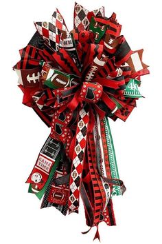 a red and black bow with footballs on it