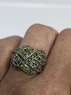 Rich and very bright green chrome diopside ring Sterling silver with rhodium finish Size 6.5 can be sized by my jeweler. His service charge is $10-$20 All rings are shipped in a nice gift box. Check out our over a THOUSAND great reviews Engraving is $4 per letter and is not always perfect depending on the piece. It can take a few days if the jeweler is busy. This is payable to Paypal Judithsltd@gmail.com Fine Green Peridot Jewelry, Green Peridot Fine Jewelry, Fine Jewelry In Green Peridot, Silver Peridot Jewelry For Anniversary, Lime Green May Birthstone Ring, Lime Green Ring For May Birthstone, Green Tsavorite Jewelry For May Birthstone, Lime Green Sterling Silver Fine Jewelry, Silver Peridot Jewelry For May Birthstone