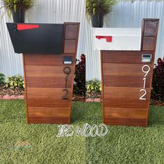 two mailboxes side by side on the grass