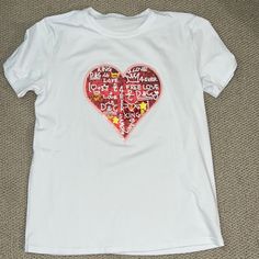 Nwot Heart Tee Material Is Thicker Than Your Average Tee Very Nice Quality Size Xl Very Stretchy Casual Valentine's Day Top With Text Print, White Valentine's Day T-shirt With Text Print, Valentine's Day White Graphic Print Shirt, Summer White Shirt With Heart Graphic, Casual Red Shirt With Heart Graphic, White Short Sleeve Tops With Heart Print, White Graphic Tee For Valentine's Day, White Graphic Tee With Heart Print, White Shirt With Heart Graphic For Spring