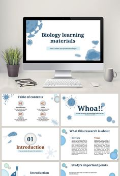 a computer monitor sitting on top of a desk next to a keyboard and mouse with the words biology learning materials