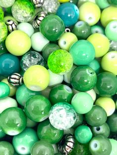 green and yellow beads are stacked together