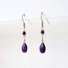 Purple Amethyst faceted flat briolette and micro faceted Purple Amethyst rondelles in sterling silver dangle earrings. Lovely and elegant jewelry made with top quality genuine gemstones in natural color with a lot of sparkle. The length of the dangle is about 1.5 inches and the earrings are lightweight and comfortable. Limited edition jewelry. Amethyst is the birthstone for the month of February. It is a powerful stone of spiritual protection and purification  Thank you for visiting my shop. Lov Sterling Silver Briolette Teardrop Gemstone Earrings, Elegant Purple Faceted Beads Gemstones, Purple Sterling Silver Teardrop Dangle Earrings, Sterling Silver Briolette Faceted Beads Jewelry, Sterling Silver Rondelle Faceted Jewelry, Silver Faceted Briolette Gemstones, Faceted Amethyst Briolette Gemstones, Sterling Silver Faceted Rondelle Jewelry, Sterling Silver Briolette Jewelry With Faceted Beads