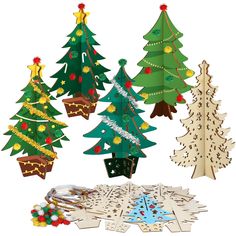 christmas tree cutouts are arranged in different shapes and sizes, including one for the center