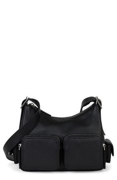 Utility style gets a refined look with this crossbody bag crafted of beautifully grained calfskin leather and equipped with a bevy of organizational pockets. Top zip closure Adjustable crossbody strap Exterior zip pockets; side magnetic-snap pockets; back zip pocket Interior zip pocket Faille lining Leather Imported Business Crossbody Hobo Bag, Textured Leather Crossbody Shoulder Bag, Black Textured Leather Saddle Bag, Woman Bags Handbags, Leather Crossbody Bag, Leather Crossbody, Calf Skin, Bags Handbags, Zip Pockets