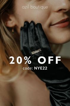 a woman wearing black gloves with the text 20 % off code ny232