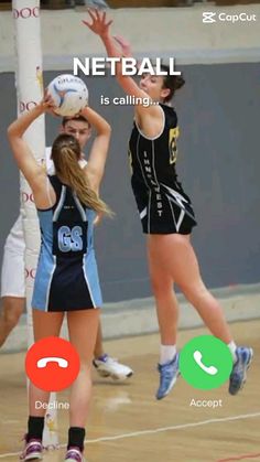 two girls are playing volleyball and one is jumping up to hit the ball with her head