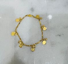 7.30g Hallmarked Yellow Gold Metal Bracelets, Gold Charm Bangle Bracelet, 22k Gold Bracelet With 17 Jewels As Gift, Handmade Yellow Gold Round Charm Bracelet, Handmade Yellow Gold Charm Bracelet, 22k Gold Jubilee Bracelet, Gold-plated Charm Bangle Bracelets, Handmade 22k Yellow Gold Bracelets, Handmade Yellow Gold Bangle Bracelet