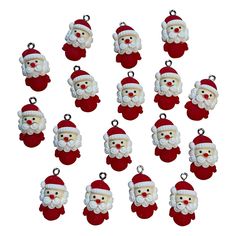 twelve red and white christmas ornaments with santa claus