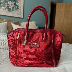 Like-New Coach Bag Color: Red Sequins Never Worn This Stunner So She’s In Excellent Condition! Willing To Negotiate Price - No Trades! Red Double Handle Bag For Party, Red Double Handle Party Bag, Red Double Handle Party Bags, Coach Leather Party Bags, Red Party Bags With Handles, Red Tote Bag For Party, Luxury Coach Bag For Party, Luxury Coach Party Bag, Luxury Coach Party Bags