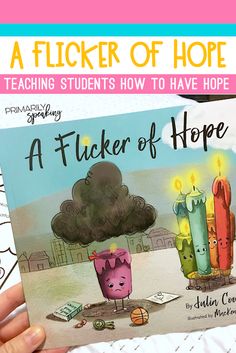 a person holding up a children's book with the title, a flickerr of hope teaching students how to have hope