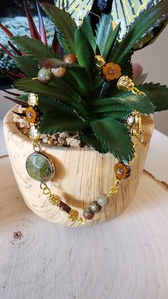 Unakite pendant charm bracelet.  Table cut daisies, gold leaves and a fun mushroom charm.  Bohemian styled.  Perfect bracelet for any occasion.  Fits most wrists with a toggle clasp Skeleton Earrings, Gold Leaves, Flower Pendant Necklace, Leaf Pendant, Toggle Clasp, Fall Flowers, Colorado Springs, Flower Pendant, Tassel Earrings