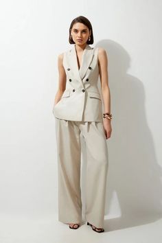 Melange Double Breasted Sleeveless Tailored Blazer | Karen Millen Elegant Beige Notch Lapel Vest, Elegant Beige Vest With Notch Lapel, Elegant Fitted Double-breasted Vest, Spring Tailored Sleeveless Suit, Chic Semi-formal Double Breasted Suit, Elegant Beige Single Breasted Vest, Chic Semi-formal Vest With Notch Lapel, Elegant Sleeveless Blazer For Office, Elegant Sleeveless Office Blazer