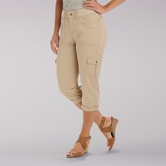 Updated style and all-day comfort in a cargo-inspired capri. You’ll love the soft fineline stretch twill fabrics, cute cargo pocket styling, and adjustable hem that you can roll up or down to vary your style. Add in a comfort elastic knit waistband and you’ll enjoy your style in comfort all day. Stretch Twill: 98% Cotton/2% Spandex 5.8oz. Caf?. 10 W / M L. Pattern: Casual Capri Length Cargo Pants, Casual Cargo Capri Pants With Pockets, Spring Casual Capri-length Cargo Pants, Beige Cotton Ankle-length Capris, Spring Capri-length Cargo Pants With Pockets, Beige Ankle-length Capris With Pockets, Fitted Casual Capri-length Capris, Cut Out Jeans, Capri Outfits