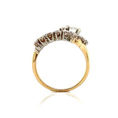 This Mid-Century Jabel heirloom cocktail ring features 1.025 total carats of diamonds in 14 karat yellow gold. One (1) Round Brilliant cut diamond is set in the center of the cluster. A swirling halo of fifteen (15) accent diamonds decorate the dynamic band. Finished in polished 14 karat yellow gold, this American-made diamond ring is expertly designed and full of life. 14k Gold Cluster Diamond Ring With Prong Setting, Yellow Gold Diamond Ring With Brilliant Cut Cluster, Cluster Yellow Gold Diamond Ring With Prong Setting, Yellow Gold Cluster Diamond Ring With Prong Setting, Gold Cluster Diamond Ring With Brilliant Cut, Formal Diamond Bypass Ring With Prong Setting, Diamond Cocktail Ring, Diamond Cocktail Rings, Shop Engagement Rings