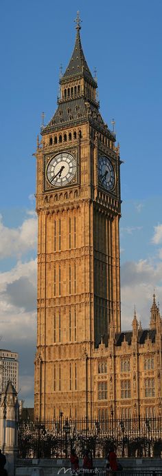 the big ben clock tower towering over the city of london