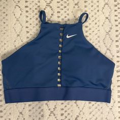 Nike Halter Top Sports Bra Pictures Darker Than Actual Color Never Worn Size Medium Summer Blue Activewear For Sports Events, Blue Sports Bra For Summer Sports, Blue Summer Sports Bra For Sports, Navy Nike Activewear For The Gym, Blue Summer Sports Bra, Nike Navy Athleisure Activewear, Blue Sports Bra For Yoga In Spring, Blue Nike Sports Bra For Training, Nike Blue Sports Bra With Moisture-wicking