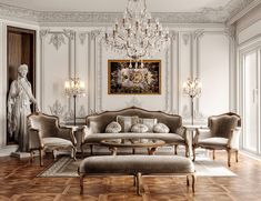 an elegant living room with chandelier and couches