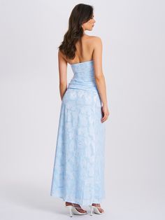 Introducing the Xatia in Baby Blue – an exquisite strapless jacquard textured maxi dress that exudes elegance and sophistication, perfect for summer. The ruched belt at the waist drapes asymmetrically to the hip, complemented by a thigh-high slit at the side. Two boned corset lines on the front bodice and a ruched panel at the bust, with sticky tape on the neckline edge for added support, ensure a chic and flattering fit. Fully lined in satin and featuring an invisible zipper at the side seam, t Maxi Light Blue Dress, Unique Blue Bridesmaid Dresses, Baby Blue Dress Formal, Baby Blue Prom Dress Long, Ice Blue Prom Dress, Long Light Blue Dress, Baby Blue Summer Dress, Baby Blue Prom Dress, Sorority Formal Dress