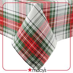 two red and green plaid tablecloths on top of each other with white background