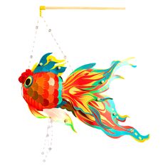 a colorful fish hanging from a hook on a white wall