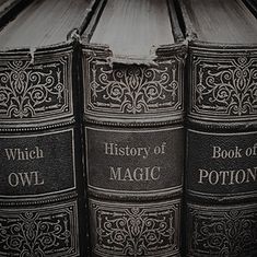 an old book is stacked on top of each other with the words, history of magic