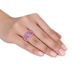 Add a delightful touch to your ensembles with this eye-catching lab-created pink sapphire floral ring. Add a delightful touch to your ensembles with this eye-catching lab-created pink sapphire floral ring.Click on this JEWELRY & WATCHES GUIDE to learn about fit, styles, materials and more! Metal: sterling silver Packaging: boxed Plating: 18k rose gold flash plated Width: 12.7 mm Finish: polishedSTONE DETAILS Stone type: lab-created pink sapphire, lab-created white sapphire Total weight: 5 1/4 ct White Sapphire Ring, Floral Ring, Modern Ring, Gemstone Studs, Pink Gemstones, Pink Ring, Beautiful Ring, Sapphire Gemstone, Sterling Silver Bands