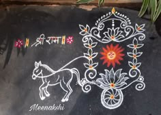 a chalk board with an image of a horse and flowers painted on it, along with the words meenashi written below