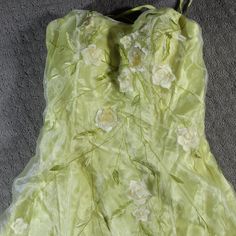 Pictures Just Don't Do This Dress Justice. It Is A Beautiful Light Yellow With A Sheer Cover That Is Embroidered With Pale Yellow Flowers With Long Thin Light Green Stems And Leaves. It Is Strapless With A Ribbon Weave Back That Pulls And Ties As The Closure. Size: 8 See Pictures For Extra Measurement Pictures Bust: 30" Flat With A Couple Of Inches For The Bra Structure Waist: 26" Length: 52" Happy To Answer Questions, Bundle With Other Items To Save On Shipping And Take Reasonable Offers. New T Dress Wishlist, Pale Yellow Flowers, Prom Outfit, Whimsical Dress, Flowery Dresses, Night Moves, Colorful Dresses Formal, Prom Dresses For Sale, Prom Outfits