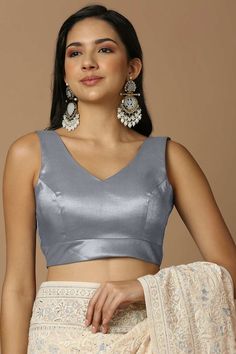 Product Features: Blouse Color: Grey Blouse Fabric: Silk Work: Solid Sleeve Length: Sleeveless In Closer: Back Open Padded / Non Padded : Padded Wash Care : Dry Clean Occasion : Festivewear, Partywear, Wedding Guest Product Type : Blouse Disclaimer: There will be slight difference in digital to actual image Padded Blouse, Indian Blouse, Grey Blouse, Gray Silk, Fabric Silk, Blouse Fabric, Sleeveless Blouse, Wedding Guest, Product Features