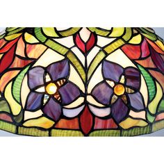 a stained glass lamp with flowers on the bottom and side panels, hanging from a ceiling fixture