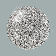 a circular object with lots of diamonds in it's center, on a gray background