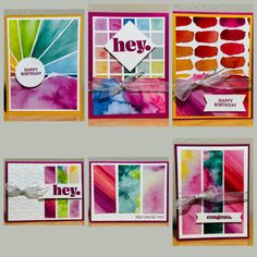 four cards with different colors and designs on them