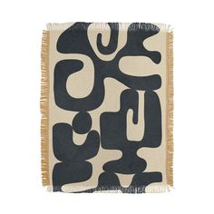 a black and white rug with an abstract design