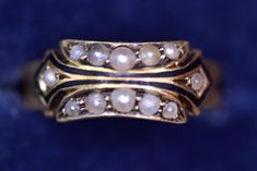 Victorian Seed Pearl Black Enamel Band Ladies 15 karat gold  Mourning Ring, full UK hallmark for Chester 1897 Ring size 6 Weight 2.5 grams. Not Sizeable. Condition: Condition is very good considering the age. The pearls are untested but likely fine natural origin pearls. Kindly review the product description thoroughly and examine all photos, as they are integral to the description and condition report. Message me with any questions prior to purchase.   Given that this item is over a century old Seed Pearl, Black Enamel, Rings Statement, Antique Jewelry, Statement Rings, Seeds, Ring Size, Jewelry Rings, Band