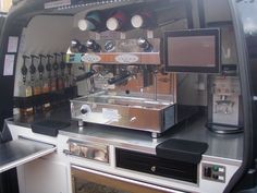 a coffee machine sitting on top of a counter