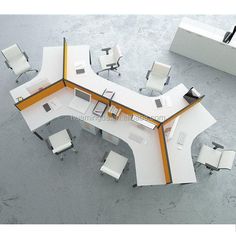 an office cubicle with chairs and desks on the floor, in white and orange