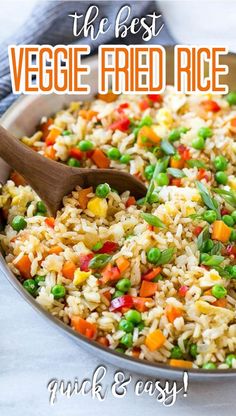 the best veggie fried rice in a pan with a wooden spoon on top