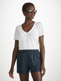 Introducing our Vienna linen shorts to our women's resort range, to sit alongside our linen trousers and shirts. Perfect to wear on holiday with our Jordan Tees. The short features an elasticated waistband with self-fabric drawcord for comfort. The back of the short features two patch pockets. We have developed a heavy-weight, beautifully soft and breathable pure linen that will keep you cool and comfortable in even the hottest of conditions. This made in Italy fabric is finished with a super sm Relaxed Linen Shorts For Vacation, Beach Linen Top, Relaxed Linen Shorts For Day Out, Short Linen Beach Top, Short Linen Top For Beach, Short Linen Vacation Top, Short Linen Top For Vacation, Summer Linen Short Tops, Casual Linen Bermuda Shorts For Day Out