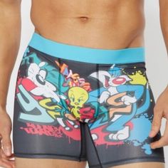 Feature A Licensed Looney Tunes Print. 6" Inseam 92% Polyester, 8% Spandex Looney Tunes, Boxer Briefs, Warner Bros, Briefs, Black Blue, Blue Black, Man Shop, Socks, Spandex