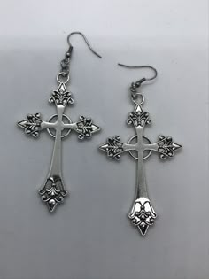 Large version of the Celtic Cross earrings i've previously posted.  These make quite the statement. Inspired by the various crosses worn by Nancy Downs.  I've finished the crosses with stainless steel hooks and hardware which should not cause allergic reactions. The cross measures about 67mm long, 40mm wide.  They are alloy and are lead and nickel free.  These earrings are bold and loud yet simple as they focus just on the cross and not added jewels.  Will be presented in organza gift bag and ca Hypoallergenic Cross Earrings, Nickel-free Metal Cross Earrings, Cross Shaped Metal Earrings For Pierced Ears, Handmade Metal Cross Earrings, Silver Metal Cross Pendant Earrings, Gothic Cross-shaped Pierced Earrings, Nancy Downs, Cross Accessories, Collar Pins