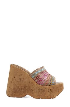 Colorful woven stripes make a splash on a retro-chic sandal lifted by a cork-textured platform-wedge sole. 5" heel; 2" platform Leather upper and lining/synthetic sole Imported Textured Sole Wedge Heels For The Beach, Beach Wedge Heels With Textured Sole, Straw Platform Wedge Heels, Straw Wedge Heels With Platform, Beach Wedge Sandals With Wooden Heel, Wedge Heels With Wooden Heel For Beach, Beach Heels With Wooden Wedge Heel, Beach Wedge Heels With Wooden Heel, Multicolor Wedge Heel Sandals With Woven Sole