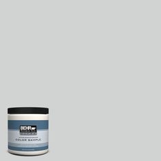 the behr paint color is light gray and it has a black lid on top