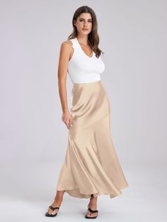 F00264892-403 Chic Beige Stretch Mini Skirt, Elegant Stretch Flared Skirt, Flattering Midi Skirt For Summer, Chic Solid Color Maxi Skirt With Lining, Chic Lined Maxi Skirt, Flattering Solid Color Lined Skirt, Flattering Solid Color Relaxed Fit Skirt, Feminine Long Skirt In Solid Color, Flattering Lined Skirt In Solid Color