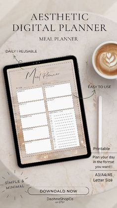 a digital planner on top of a tablet next to a cup of cappuccino