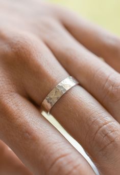 Our wide hammered stacking ring features 4mm wide sterling silver wire that has been hammered to add a sparkling texture. The ring is great on it's own, or paired with our other rings. Handmade from .925 sterling silver.  - .925 Sterling Silver - 4mm wide band - Handmade to order - Production time is 1 week - Comes neatly packaged in a kraft jewelry box ready for gifting Silver Hammered Jewelry, Unique Wedding Bands Silver, Silver Ring Making Ideas, Handmade Wedding Ring, Hammered Wide Band Rings For Everyday, Silver Handmade Ring, Hammered Thick Band Wide Ring For Promise, Hammered Wide Band Ring For Promise, Minimalist Hammered Sterling Silver Wide Band Ring